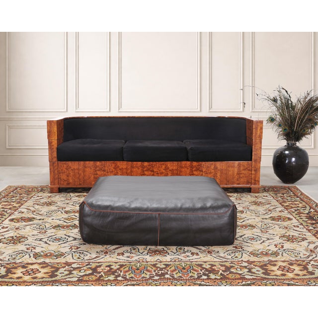A modern oversized leather "950" floor cushion or pouf made by Rolf Benz in Germany measuring over 3 feet wide. The large...