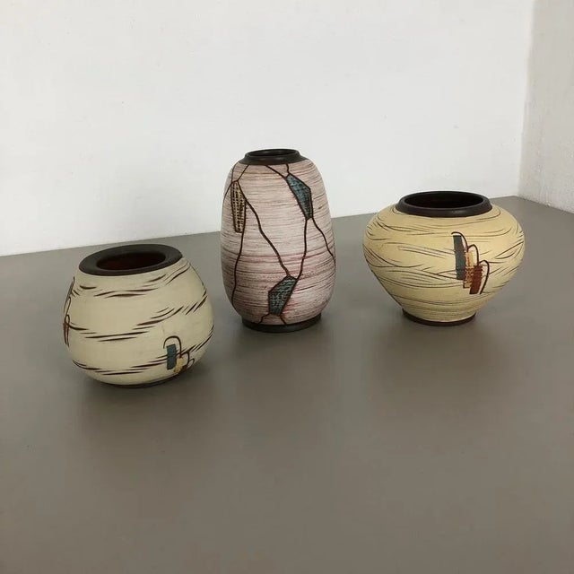 Article: Pottery ceramic vases set of 3 Producer: Sawa Ceramic, Germany Design: Franz Schwaderlapp Decade: 1960s...