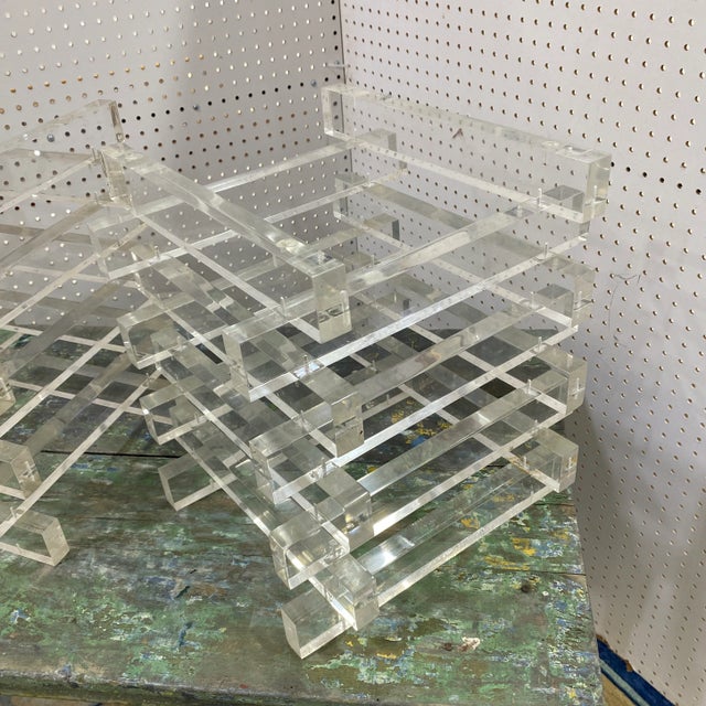 Beautiful pair of 1970s lucite table bases could be used as a pair of end tables or as a coffee table. No glass