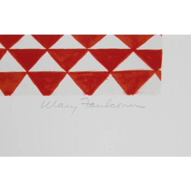 Mary Faulconer's depiction of a potted strawberry plant covering a newspaper and sitting on a triangular patterned red-...