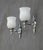French Neoclassical Revival Style Chrome wall light sconces, C1970s. Stylish French applique lighting in chrome, with...