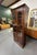 Beautiful Ethan Allen Georgian Court cherry wood display cabinet. It features a high quality glass door cabinet with...