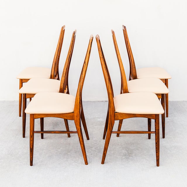 A beautifully restored set of six vintage “Eva” chairs in Brazilian rosewood by Niels Koefoed, produced in Denmark in c...