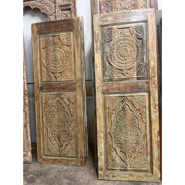 Make an unforgettable design statement with this exquisite vintage sliding barn door, hand-carved in India with an...
