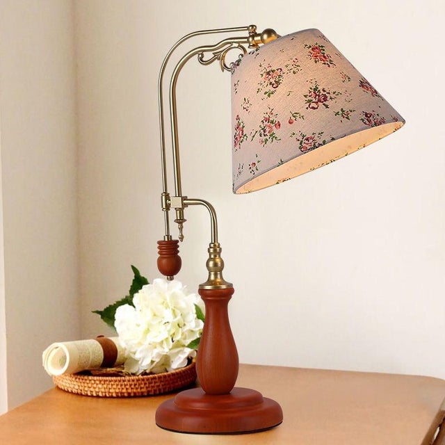 Shade is light-based floral fabric (fresh retro), body is solid wood base + gilded copper adjustable arm (delicate knob...