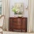 Offering abundant storage behind two doors and inside three dovetailed drawers, this spacious console cabinet is crafted...