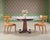 A handsome circular expanding pedestal "Castle Bromwich" jupe style dining table made by Theodore Alexander. Hand-crafted...