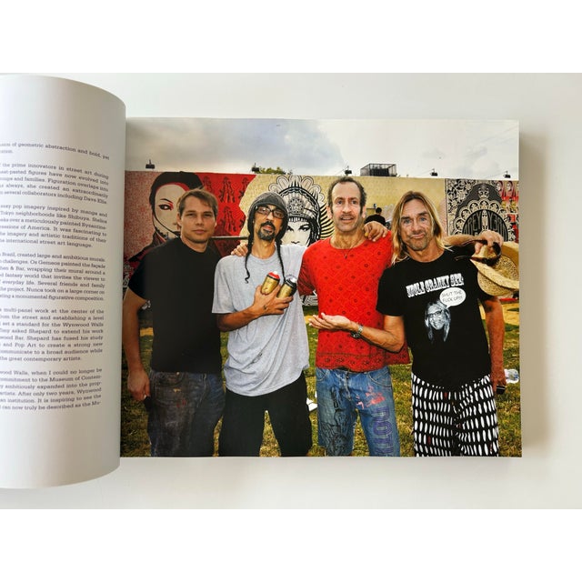 Incredible piece of Miami art history! Soft cover coffee table book, The Wynwood Walls and Doors is an overview and...
