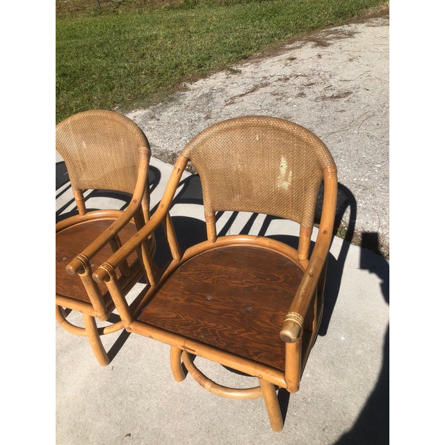 Distinctive Rattan Furniture Clark Casual Furniture, Inc. Boho Rattan Swivel Dining Chairs Set