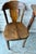 Antique kitchen table set. Solid oak table with three matching chairs. Carved backs on the chairs. Everything is very...