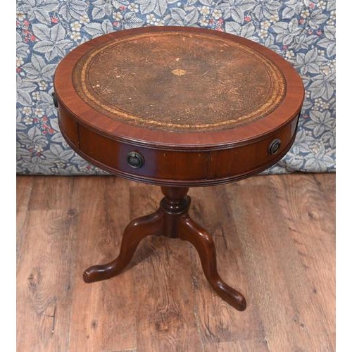 Fine quality Georgian style mahogany drum table with inset tooled leather writing surface Circular top with beautifully...