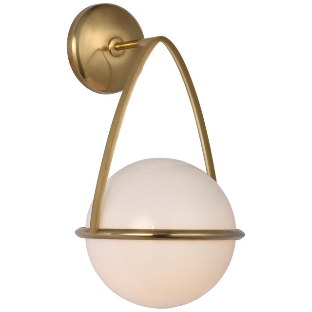 Lisette Bracketed Sconce in Hand-Rubbed Antique Brass with White Glass Designer: AERIN Height: 13.75" Extension: 8.5"...