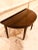 Fine George iii period mahogany demilune table with tapering square legs ending in brass cups with castors. Impressive...