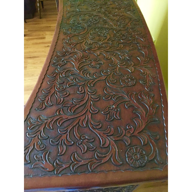Having lived in Peru,my parents bought a lot of hand tooled,handmade leather furniture from the locals there. A lot of...