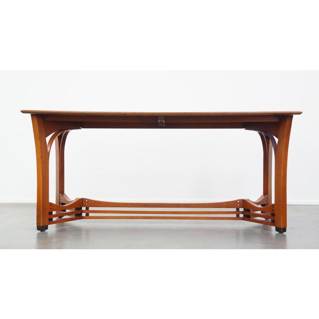 Offered is this very beautiful 4 to 6 person Art Nouveau design dining table from Schuitema with wonderful details. This...