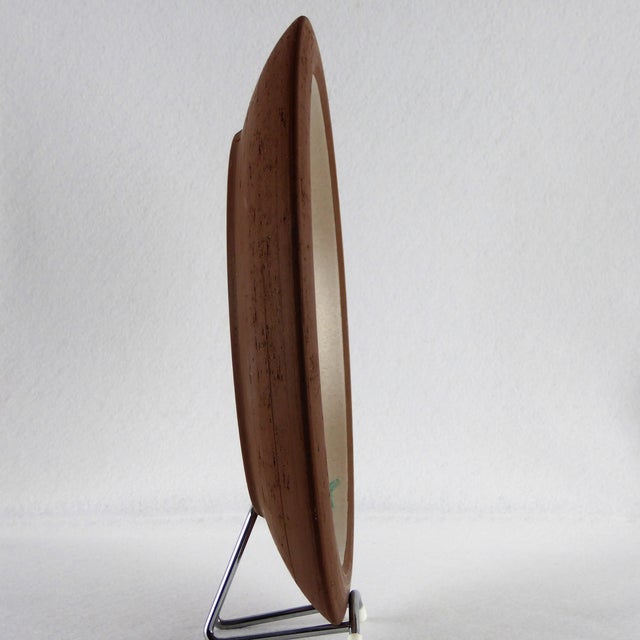 Large ceramic wall plate by S.J Odde 1960. Gray enamel background with floral decoration. Signature on the reverse S.J...