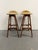 This pair of Erik Buch bar stools are in solid condition, however the upholstery needs to be replaced as there are stains...