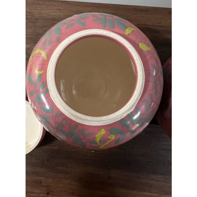 Each jar features a traditional temple or baluster form with a domed lid topped by a classic foo-dog, lotus bud, or...