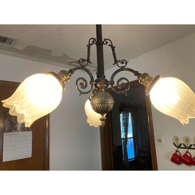 antique electric Victorian Japanned copper three light chandelier. Well cared for. Hung in my childhood home until very...