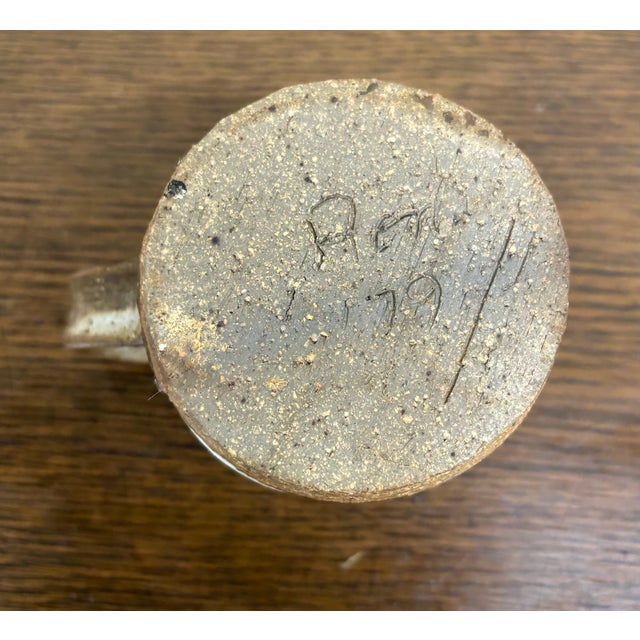 This is a beautiful vintage handmade studio art pottery coffee mug or tea cup made in 1979. Separately selling a non-...