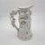 This antique Parian Ware pitcher showcases intricate figural scenes, including Triumph of Silenus and Bacchanalian Dance....