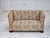 1950s, Danish 2-seater sofa. Beige/ brown furniture fabric, oak wood legs, brass springs in the seat. Sofa was...