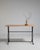 A rare mobile variation of the classic bistro table, featuring casters for easy movement. This design reflects more...