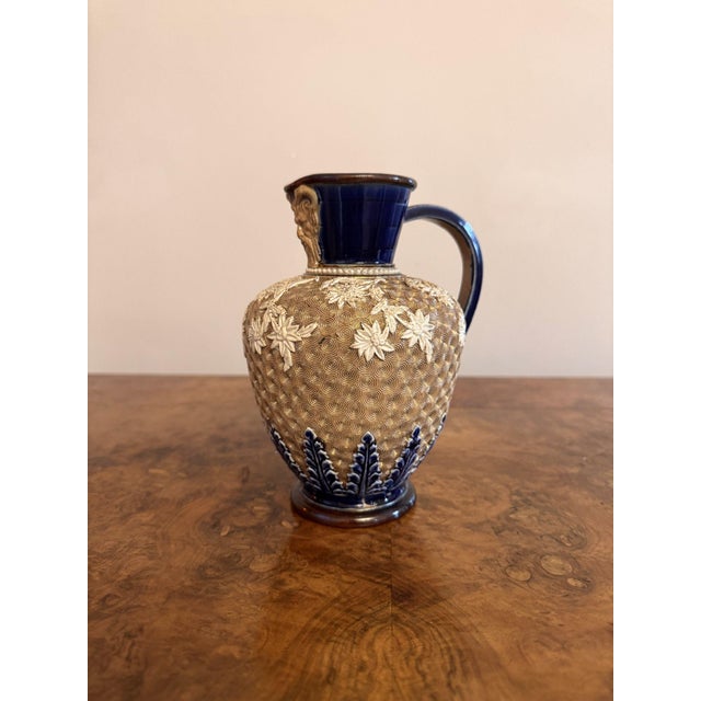 Attractive quality antique dolton lambeth jug by emma shute, having a quality antique doulton lambeth jug with a golden...