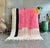 his stunning M'rirt rug is a one-of-a-kind piece hand-knotted by master weavers in the Atlas Mountains of Morocco. Its...