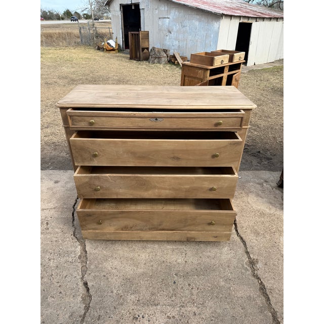 19th Century French Louis Philippe Commode from France. Made of walnut, the wood was professionally sanded and bleached,...