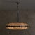 An Italian chandelier from the 1960s, in the manner of Fontana Arte, defined by its elongated, horizontal form and layered...