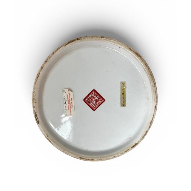 Beautiful vintage Chinese porcelain vase featuring a finely hand-painted scene of a monkey family gathered in a serene...