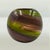 Mid-century modern spherical art glass vase, hand-blown in Murano, Italy, circa 1960. This exquisite piece features a...