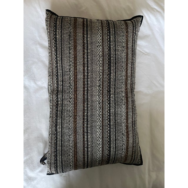 Brown, black and cream textured lumbar pillows. Beautiful coloring and texture that works well on the sofa or bed. They...