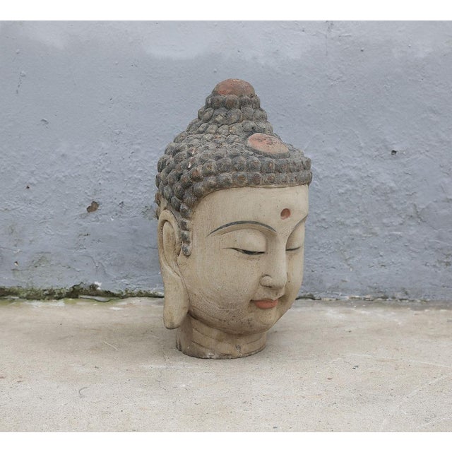 Vintage Chinese Painted Wood Buddha Head, with a painted Urna (In Buddhist art and culture, is placed on the forehead of...
