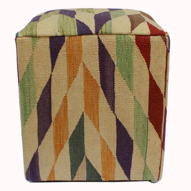 Chic handmade ottoman crafted using wood and upholstered using hand-woven kilim wool rug is a multi-purpose fashion pouf...