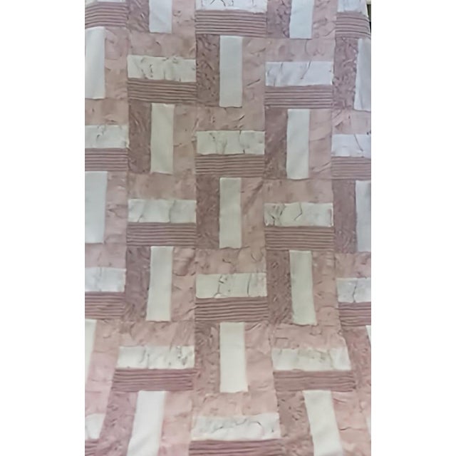 This is a rare Sew Sweet Minky Designs patchwork luxe throw blanket in soft pink tones, featuring a handcrafted patchwork...