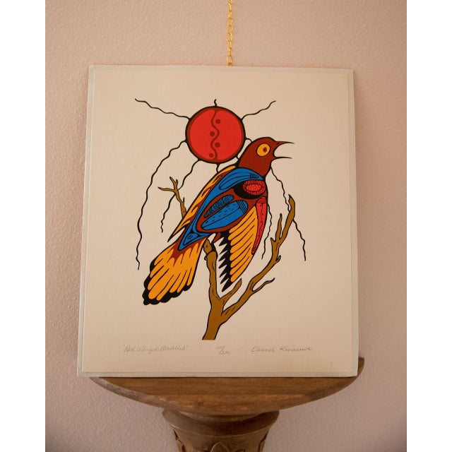 "Red Winged Blackbird" by Eleanor Kanasawe signed and numbered 141/200. Eleanor Kanasawe is an indigenous artist from...