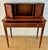 Elegant spanish writing desk from the 1940s, with fine veneer work and clean, classic lines. The desk features a spacious...