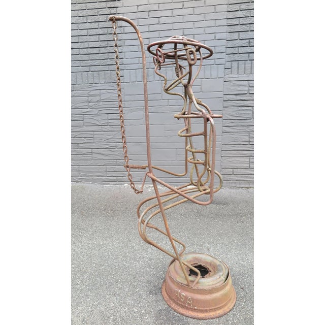 Metal Fisherman sculpture by A.R. Gately, noted American Folk Artist. A outdoor Fisherman Sculpture made of metal bar and...