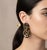 These striking 1980s Italian chandelier earrings perfectly embody the bold, glamorous aesthetic of the decade, combining...
