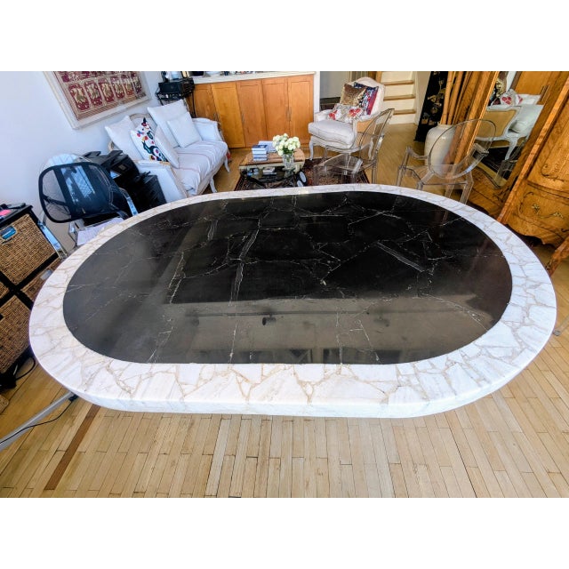 Bring 1980s architectural glamor into your dining room with this striking racetrack oval dining table. Attributed to the...