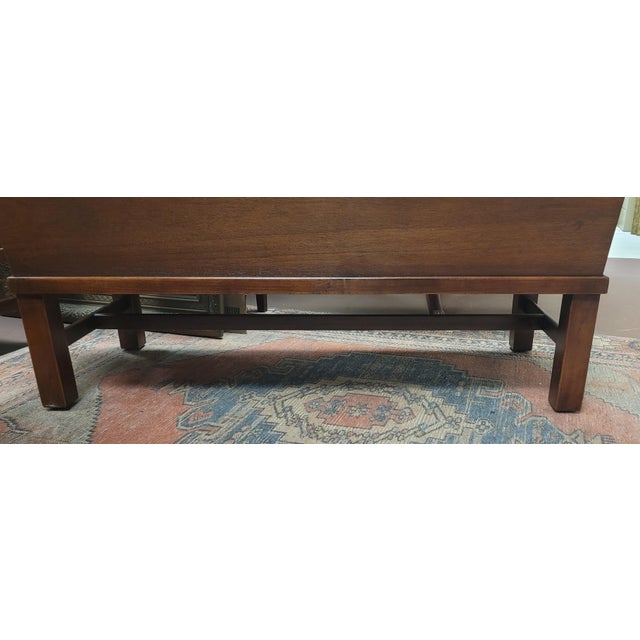 Fine pair of mid century Chippendale style planters. Features wood construction stretcher base tappered tops and heavy...