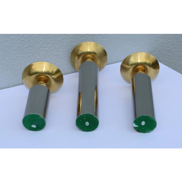 980's modern brass and chrome candle holders in the style of Karl Springer, in vintage condition with some wear and patina...