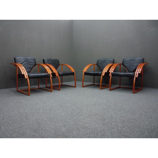 Futuristic armchair from Eastern Europe. Very elegant design from the 70s or 80s. Seat and backrest covered with genuine...