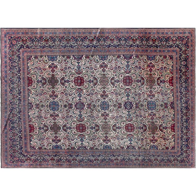 This elegant early 20th-century carpet is an exceptional example of refined workshop weaving, admired for its...