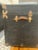 Early 20th Century Antique 1920s Black Flat-Top Steamer Trunk With North Dakota Lithograph and Brass Hardware For Sale - Image 5 of 9