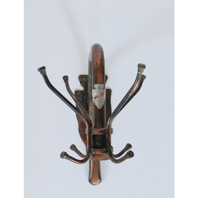 Vintage 'PeeDee' japanned wall tree coat rack. These are the wall hanging versions of the traditional hall tree, made by...