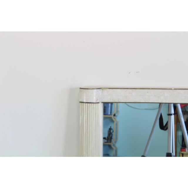 Vintage pencil reed mirror with brass and tessellated stone accents This minor is in great vintage condition Dimensions;...