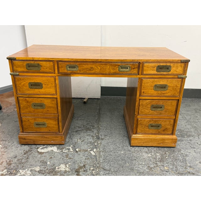Design Plus Gallery presents a Vintage Campaign Style Oak Pedestal Desk by National Mt. Airy. This traditional desk...